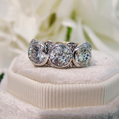 custom three stone diamond engagement ring