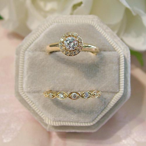 halo gold engagement ring with custom wedding band